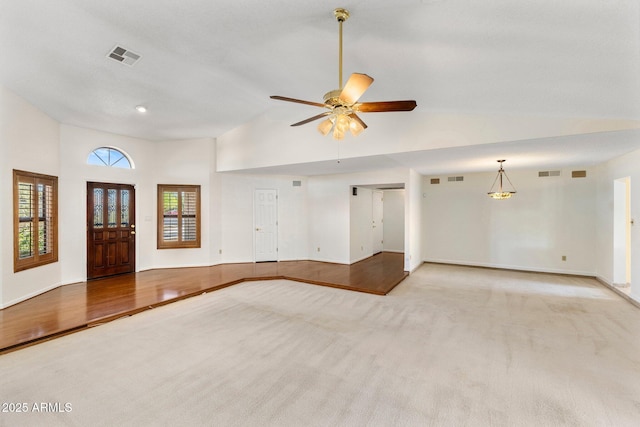 1017 E Grandview Rd, Phoenix, AZ 85022 - entrance foyer featuring ceiling fan, high vaulted ceiling, carpet flooring, and baseboards