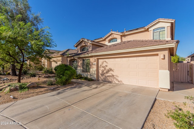 view of front of property with a garage