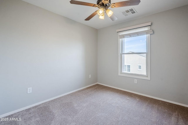 empty room with carpet flooring and ceiling fan