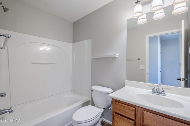 full bathroom featuring shower / tub combination, vanity, and toilet