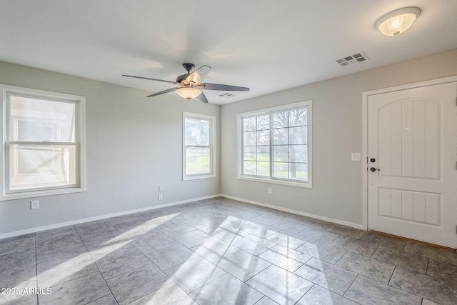 spare room featuring ceiling fan