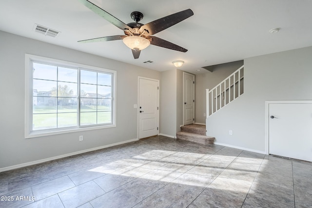 interior space featuring ceiling fan