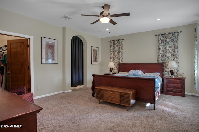 carpeted bedroom featuring ceiling fan