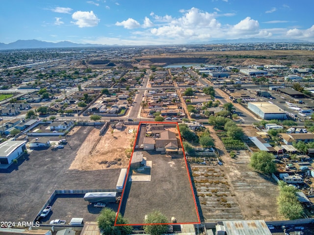 birds eye view of property featuring a mountain view