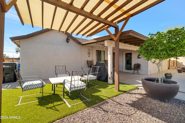 view of patio / terrace featuring a pergola