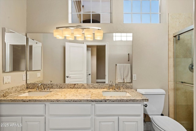 1507 E Treasure Cove Dr, Gilbert, AZ 85234 - full bathroom with double vanity, toilet, tiled shower, and a sink