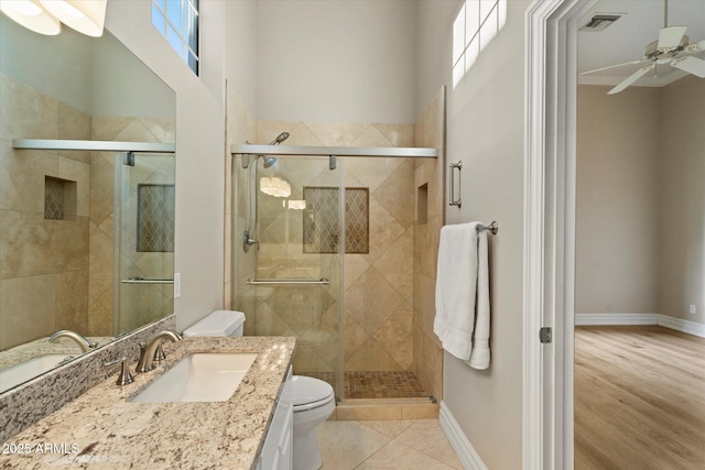 1507 E Treasure Cove Dr, Gilbert, AZ 85234 - bathroom featuring vanity, toilet, plenty of natural light, and a stall shower