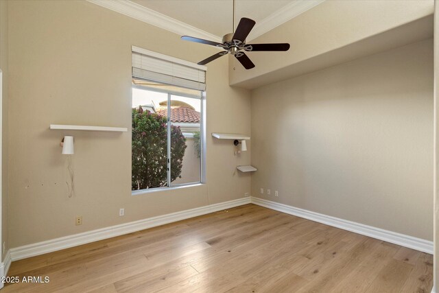 1507 E Treasure Cove Dr, Gilbert, AZ 85234 - spare room featuring crown molding, a ceiling fan, baseboards, and wood finished floors