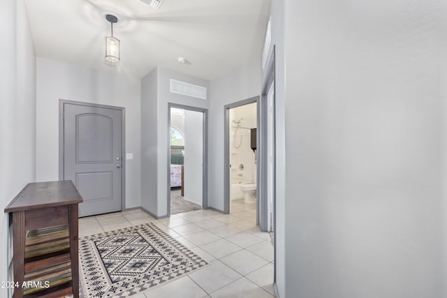 entrance foyer featuring light tile patterned flooring