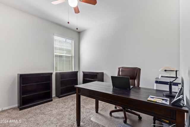 carpeted office with ceiling fan