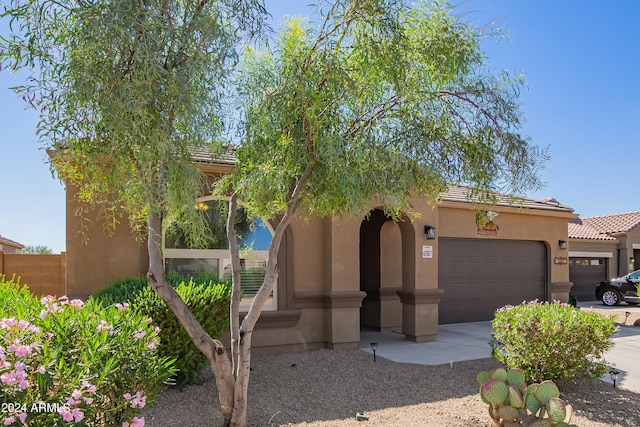 view of front of property featuring a garage