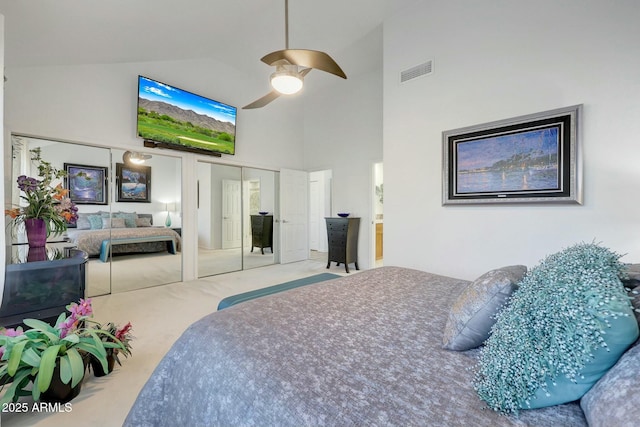 bedroom with high vaulted ceiling and ceiling fan