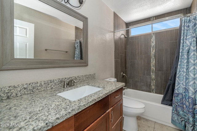 4813 W Belmont Ave, Glendale, AZ 85301 - bathroom with a textured ceiling, tile patterned flooring, shower / tub combo, vanity, and toilet