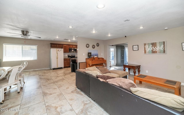 4813 W Belmont Ave, Glendale, AZ 85301 - living area with recessed lighting, ceiling fan, and baseboards