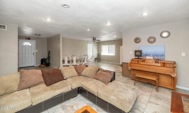 4813 W Belmont Ave, Glendale, AZ 85301 - living room with baseboards, a ceiling fan, recessed lighting, and visible vents
