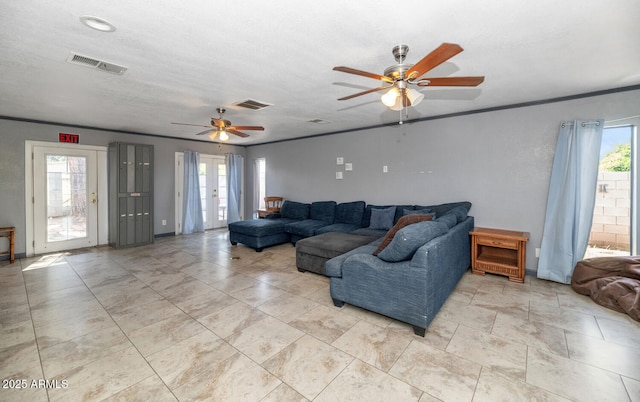 4813 W Belmont Ave, Glendale, AZ 85301 - living room with a ceiling fan, visible vents, and a wealth of natural light