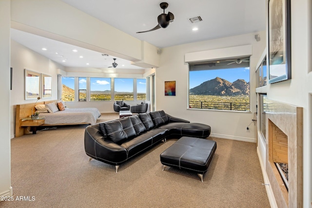 bedroom featuring a mountain view and carpet