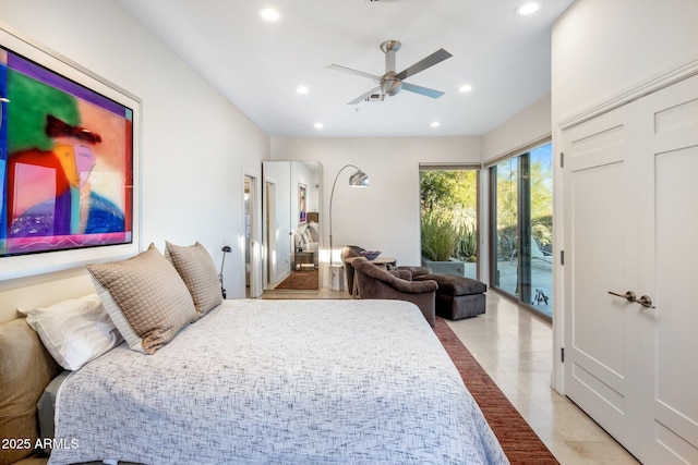 tiled bedroom featuring ceiling fan and access to exterior