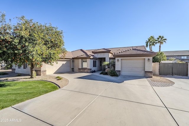 view of front of house featuring a garage and a front yard