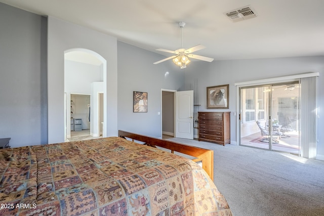 carpeted bedroom featuring ceiling fan, lofted ceiling, and access to exterior