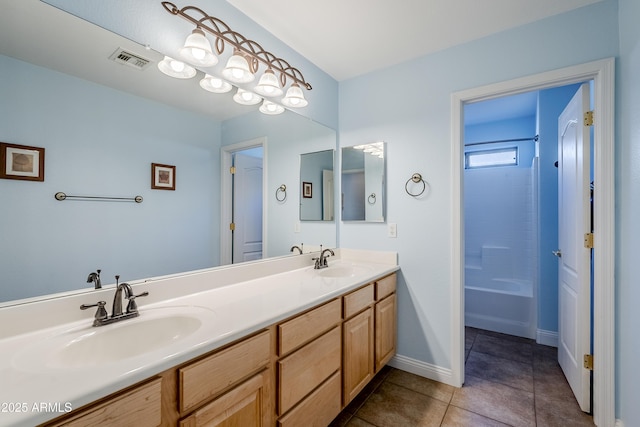 bathroom with vanity, tile patterned flooring, and shower / bathing tub combination