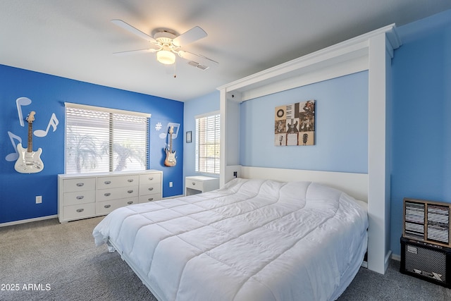 bedroom with ceiling fan and carpet