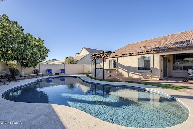 view of pool featuring a patio