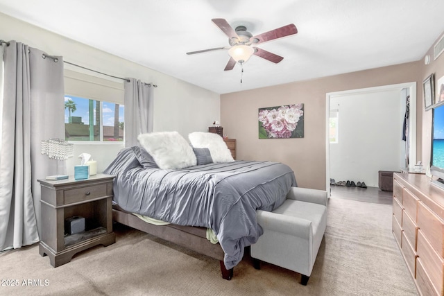 bedroom with carpet flooring and a ceiling fan