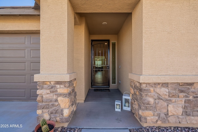 property entrance featuring a garage