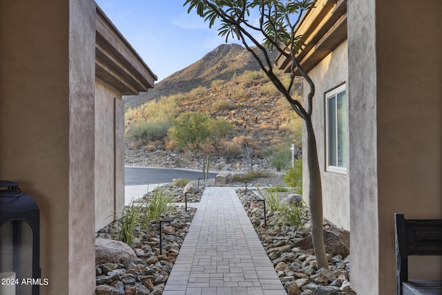 view of home's exterior with a mountain view