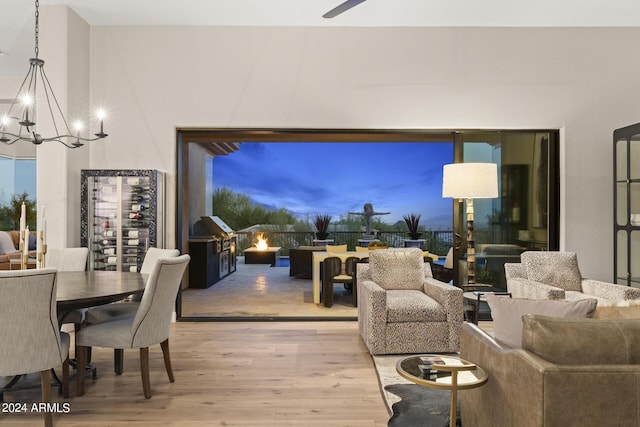 living room featuring a chandelier and hardwood / wood-style flooring