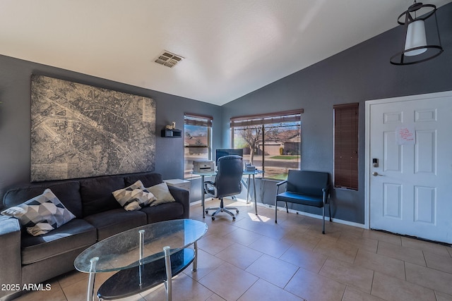 13547 W Peck Dr, Litchfield Park, AZ 85340 - tiled living room with baseboards, visible vents, and vaulted ceiling