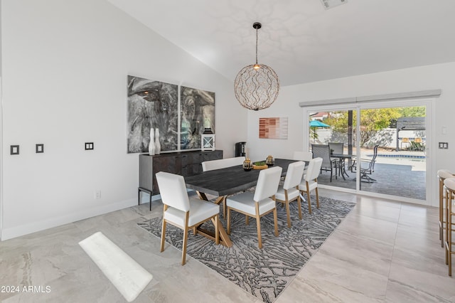 dining area with vaulted ceiling