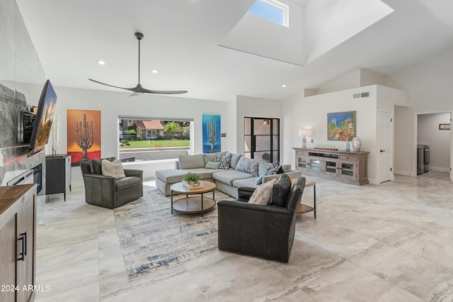 living room with high vaulted ceiling and ceiling fan