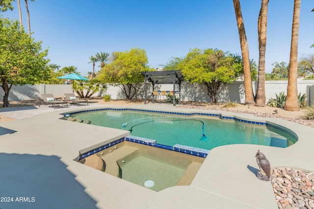 view of pool featuring a pergola, an in ground hot tub, and a patio area