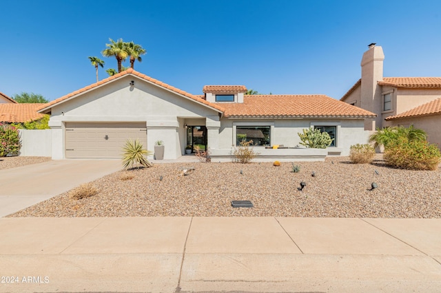 view of front of property with a garage