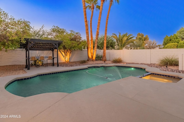 view of pool with an in ground hot tub, a patio area, and a pergola