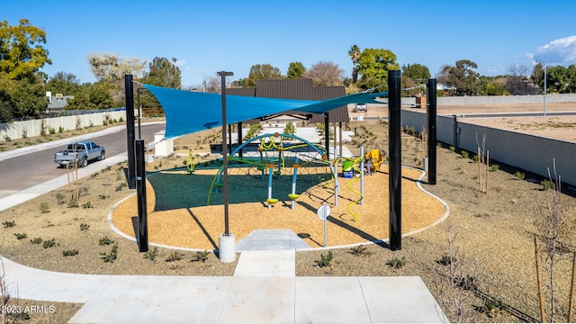 view of community featuring playground community