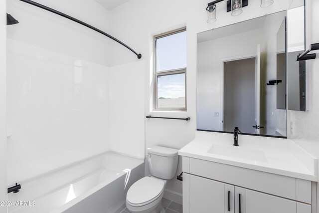 full bathroom featuring tile patterned flooring, vanity, toilet, and bathing tub / shower combination