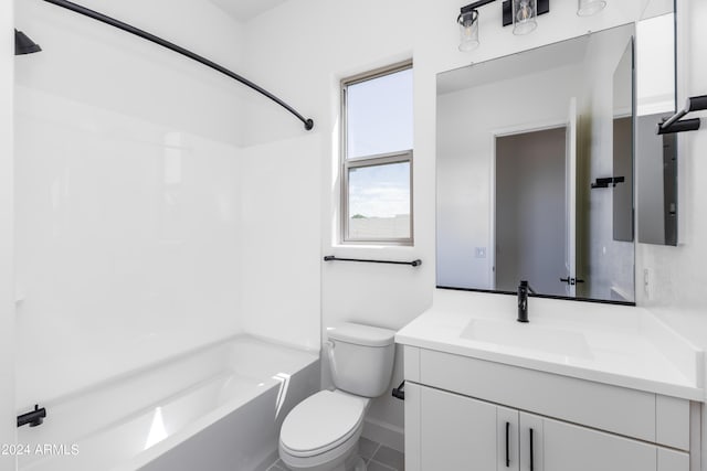 bathroom with toilet, shower / washtub combination, and vanity