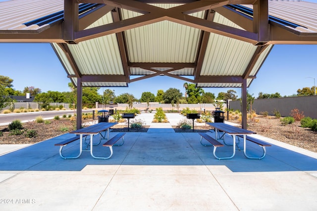 view of patio featuring fence