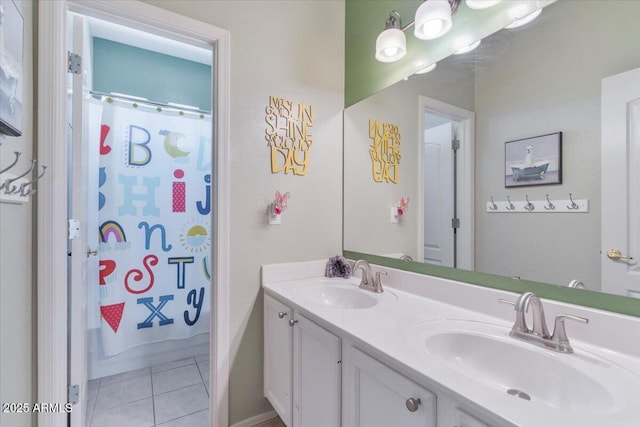 full bath featuring double vanity, a sink, tile patterned flooring, and shower / bath combo with shower curtain