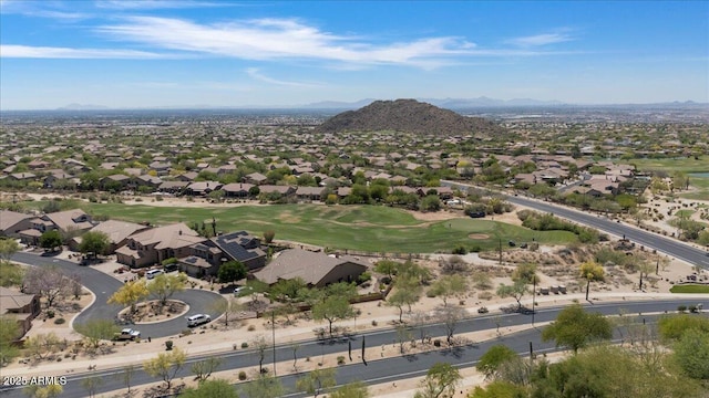 bird's eye view with a mountain view, golf course view, and a residential view