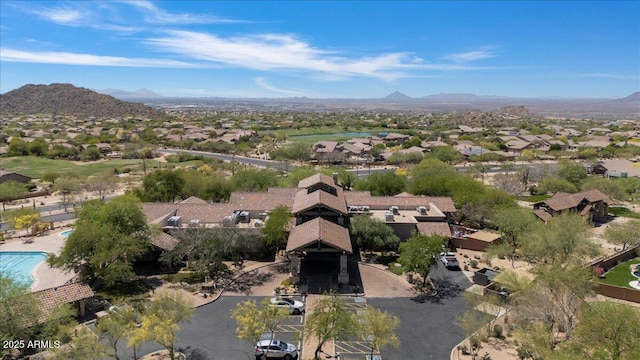 birds eye view of property with a residential view and a mountain view