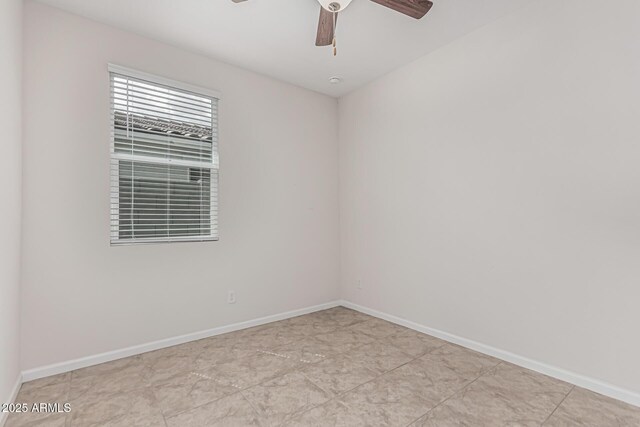 17376 W Via De Luna Dr, Surprise, AZ 85387 - spare room with ceiling fan and baseboards