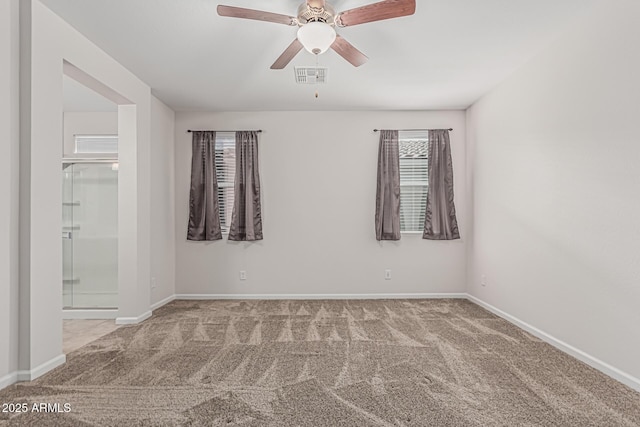 17376 W Via De Luna Dr, Surprise, AZ 85387 - spare room with a ceiling fan, baseboards, visible vents, and carpet