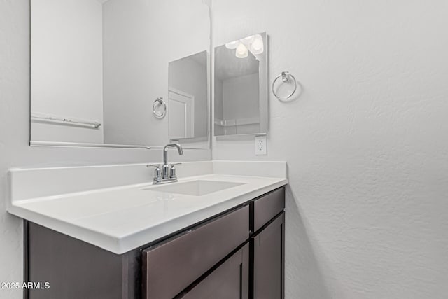 17376 W Via De Luna Dr, Surprise, AZ 85387 - bathroom featuring a textured wall and vanity