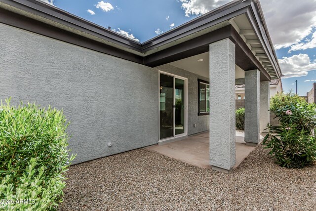 17376 W Via De Luna Dr, Surprise, AZ 85387 - rear view of house with a patio area and stucco siding