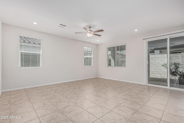 17376 W Via De Luna Dr, Surprise, AZ 85387 - spare room with visible vents, a ceiling fan, light tile patterned flooring, and recessed lighting