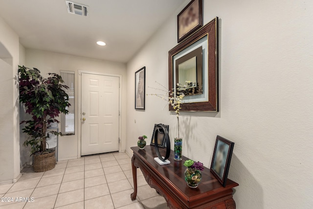 interior space featuring light tile patterned floors